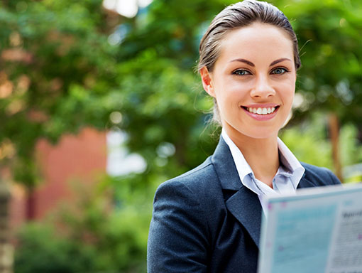 Business-Woman-Smiling-Outside | Robert A. Lantzy, DMD, LLC elderly couple smiling outdoors